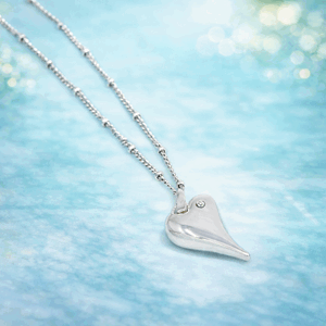 Halvlangt smykke kulek. lykke