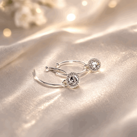 Øredobber sølvfarget klar stein