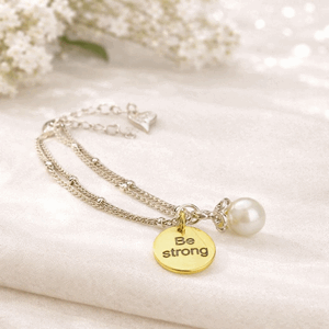 Armbånd sølvfarget kulelenke perle tekst be strong